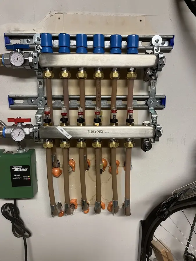 Plumber performing Water Heater Repair at a residential property in Windermere